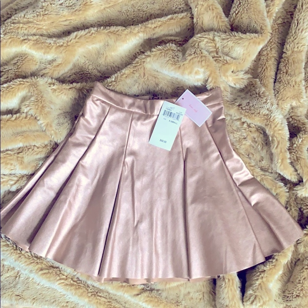 New love...ady metallic rose gold mini skirt